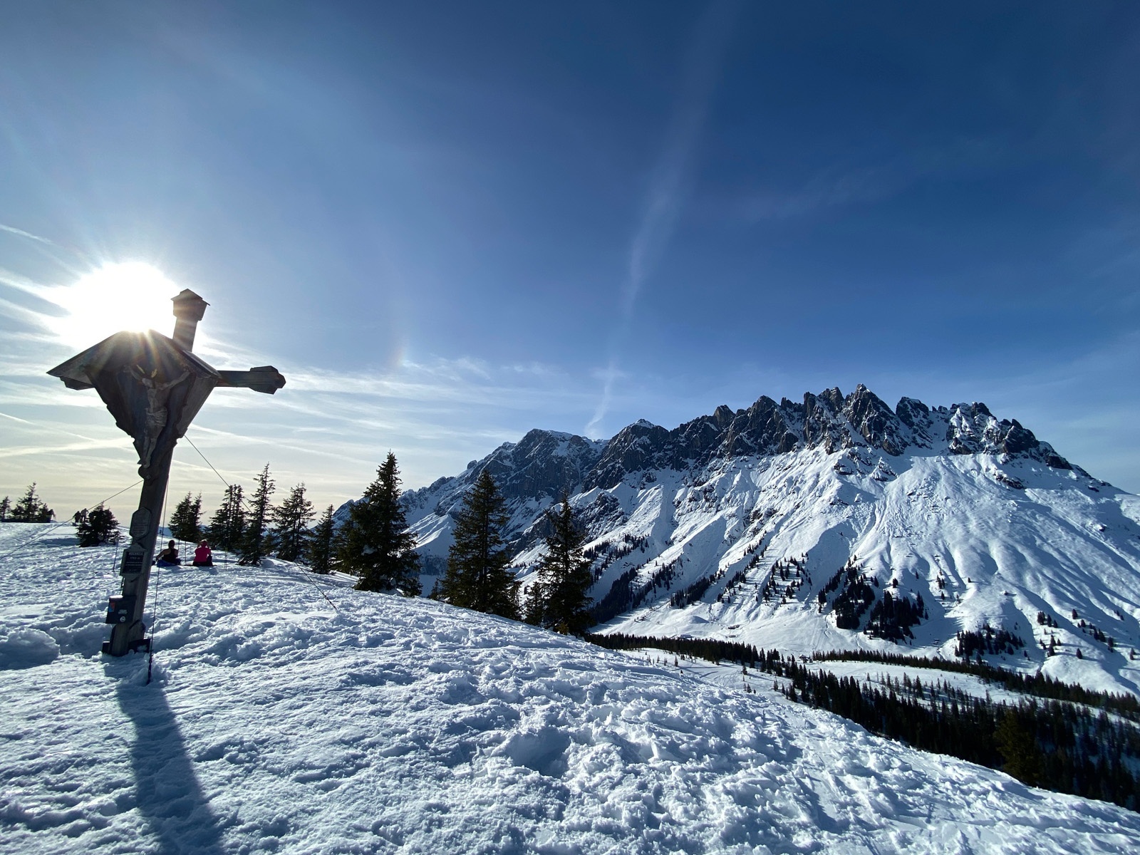 On the summit with a view of the Mandlwand in the Hochkönig massif
